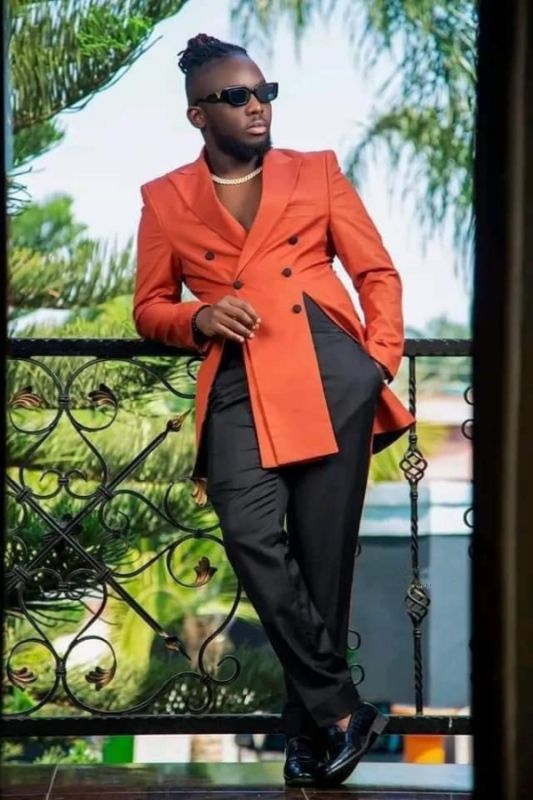 Stylish Orange Peaked Lapel Double Breasted Two Piece Prom Suits With Front Vents