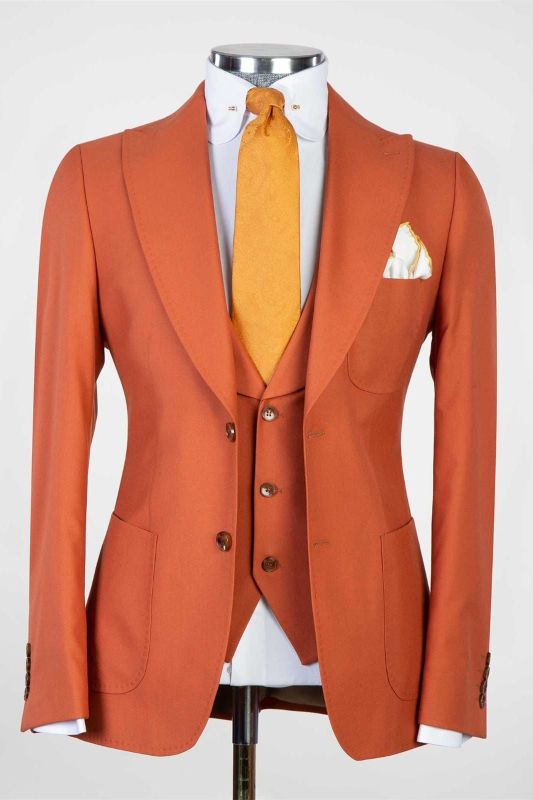 Modern orange slim fit three-piece men's suit with pointed lapels